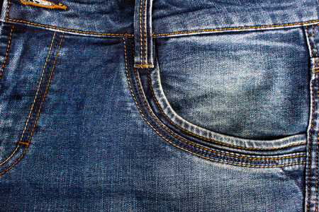 Photo of a blue jeans pants texture close up view.の写真素材