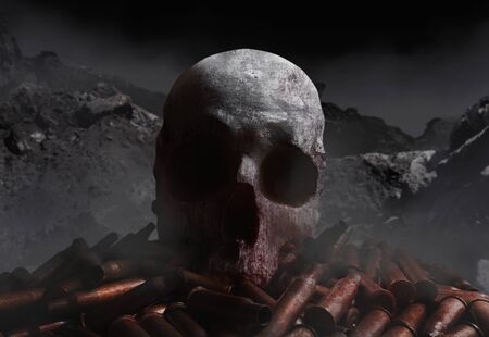 Photo of a bloody skull laying on a pile of rifle  gun shells on gloomy rocks background with fog.の写真素材