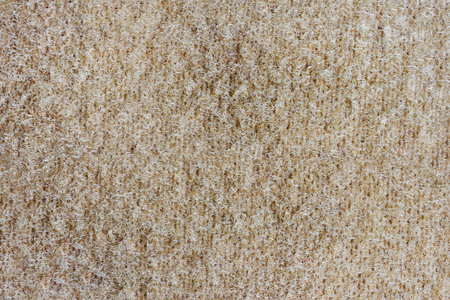 Texture close-up photo of brown colored material.