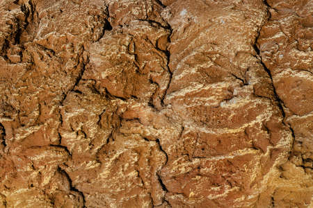 Texture photo of brown colored stone concrete wall pattern.