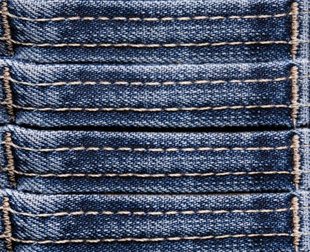 Texture backdrop photo of blue colored denim cloth stripes.の写真素材