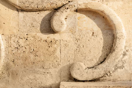 Photo texture of decorative stone wall ornament.の写真素材