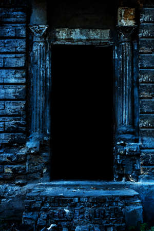 Photo of blue toned old and cracked building door entrance.の写真素材