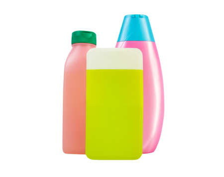 Isolated photo of blank multi colored shampoo bottles on white background.の写真素材