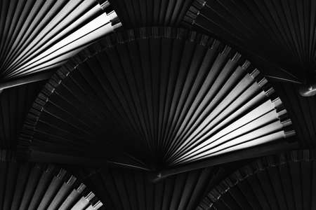 Seamless photo texture pattern of japanese wooden black colored folding fan with no painting on black background.の写真素材