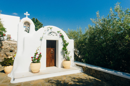 One of many typical chapels of Greek Orthodox Church in Mykonos townの写真素材