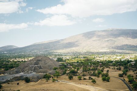 Teotihuacan, Mexico. view from the top of the Moon Pyramid. The Sun Pyramid and Avenue of the Dead can be seen in the distance.の写真素材