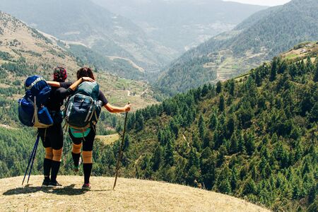 Hiking in Himalaya. Woman Traveler in the Mountains. Nepal