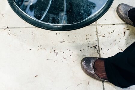 Hair on the floor in the barber shopの写真素材