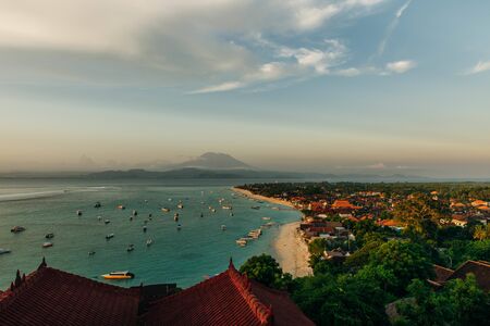 Panoramic view of the northern coast of the island of Lembongan and Jungutbatu village. Gungung Agungの写真素材