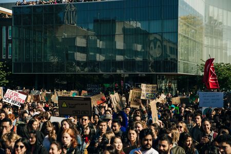 Striking people at rallies on environmental occasion global warming