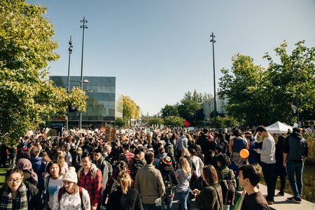 Striking people at rallies on environmental occasion global warming