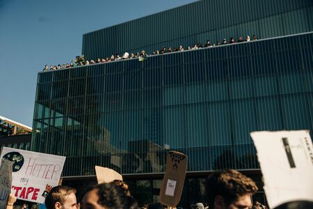 Striking people at rallies on environmental occasion global warming