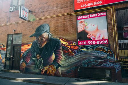 TORONTO, CANADA - november, 2019 Part of Grafitti in chinatown Toronto during the day.