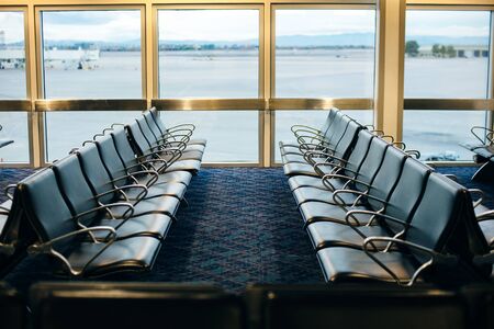 Aeroport Waiting Area with Control Tower in the background, USA