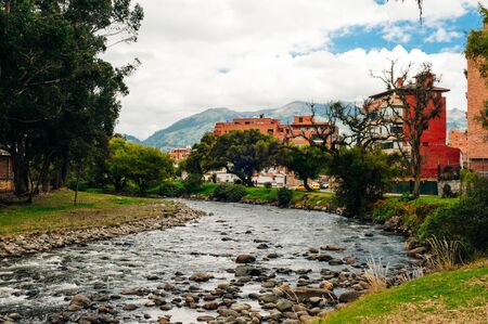 Cuenca, Ecuador - February, 2019 View of the river Tomebamba and public park along the river that crosses the center city of Cuencaのeditorial素材