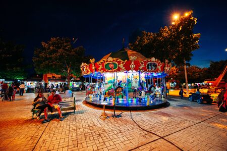 Parque de las Palapas, cancun, mexico - june, 2019 square carousel.
