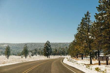 Snowy winter road. Winter fairy tale. Ride on a winter roadの写真素材