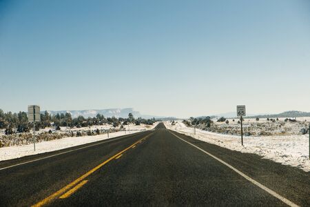 Snowy winter road. Winter fairy tale. Ride on a winter roadの写真素材