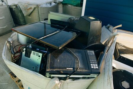 old household appliance recycling scrap yard at recycled station.の写真素材