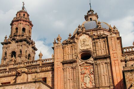 Catedral de Morelia - Construction of the church building, using local pink stone, Mexico -december, 2019.のeditorial素材
