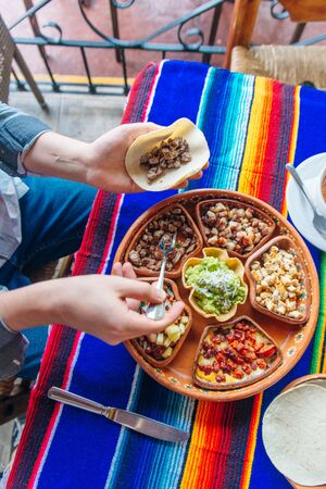 mexican plate with different meat and guacamoleの写真素材