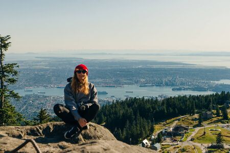 touristson Grouse Mountain with Downtown city. North Vancouver, BC, Canadaの写真素材