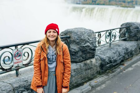 NIAGARA FALLS - CANADA, december 2019 Canadian side of Niagara Falls in autumn. ship with tourists.の写真素材