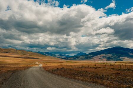 beautiful road in the field between the borders of chile and argentina.の写真素材