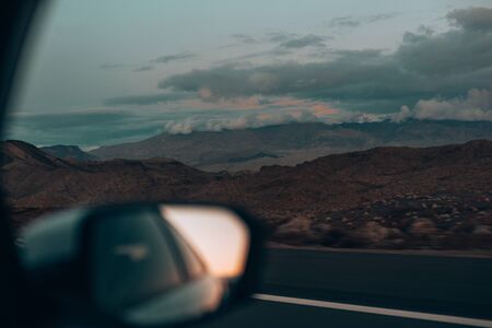 Sunset in a rear view mirror in nevada, usa