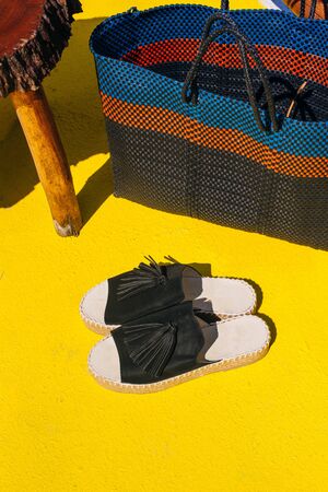 black shoes on the yellow floor.の写真素材