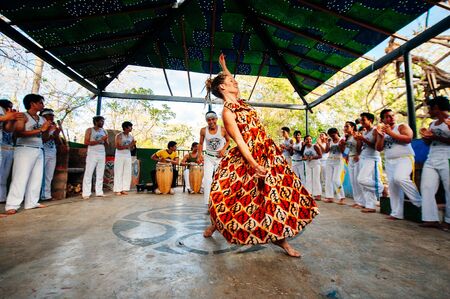 SALVADOR, BRAZIL - January 2019 Brazilian capoeira group performs for a crowd.