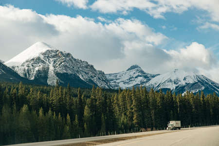 Scenic road through the Canadian Rockies, surrounded with rocky mountains. Taken in Banff National Park, Alberta, Canad.のeditorial素材
