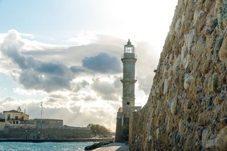 Venetian harbour and lighthouse in old harbour of Chania, Crete, Greece - sep, 2019.の写真素材