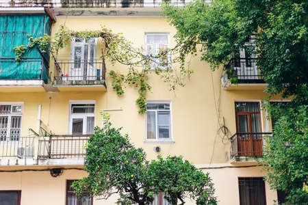 georgia, batumi - september, 2019 Traditional Georgian house. high-rise building with different...