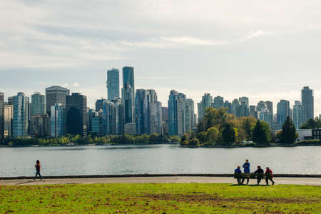 Stunning cityscape view of Vancouver skyline and Burrard Inlet from Stanley Park at sunrise in autumn, Vancouver, British Columbiaのeditorial素材