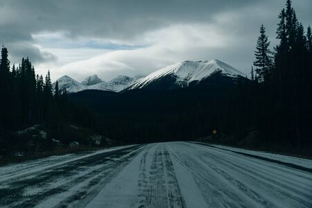 Serene sunrise at the Spray Lakes Reservoir is a reservoir in Alberta, Canadaの写真素材