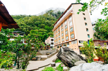 Aguas Calientes, Peru - dec, 2019 View of the Urubamba river through the Aguascalientes village.のeditorial素材