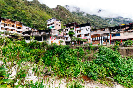 Aguas Calientes, Peru - dec, 2019 View of the Urubamba river through the Aguascalientes village.のeditorial素材