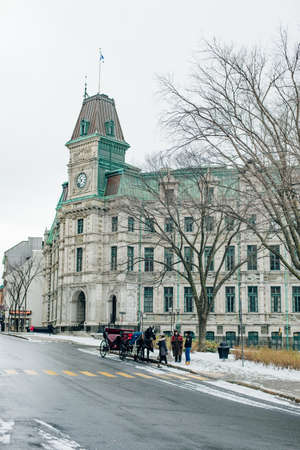 QUEBEC, canada - dec, 2019 in winter time. place near Fountain Monument of Faith. horsesのeditorial素材