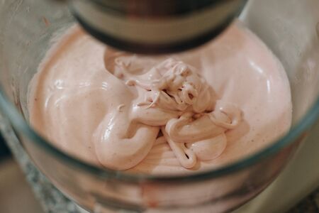 Food processor to kneading dough for zephyr. Manufacturing process of sweet cake.の写真素材