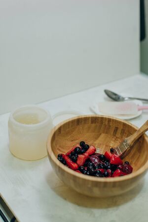 strawberry in gel for a cake on the kitchenの写真素材