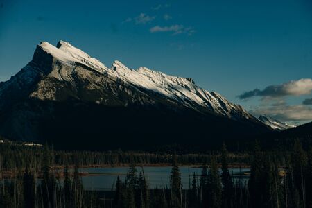 Snowy winter scenery in the Canadian Rocky Mountains - Mount Rundle and Vermillion Lakes - Banff National Park, Canada.の写真素材