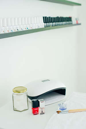 usa, la - january, 2020 UV lamp. manicure specialist set. Small nail art and manicure businessのeditorial素材
