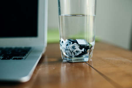 cleaning laptop keys in water. Laptop repair.の写真素材