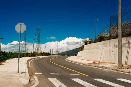 curved road in mountains with cliff.の写真素材