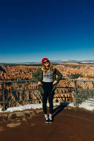 girl traveler on viewpoint in Bryce Canyon National Park in Utahの写真素材