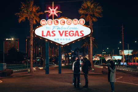 Welcome to Fabulous Las Vegas Sign on black background, USA - December, 2019.のeditorial素材