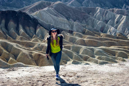 tourist in Zabriskie Point in Death Valley National Park, California, USAの写真素材
