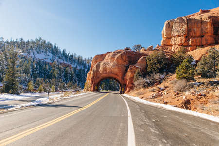 Red Arch road tunnel on the way to Bryce Canyon National Park,Utah,USAの写真素材
